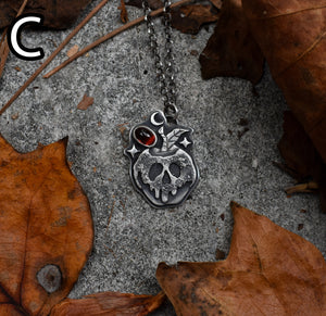 Candied Poison Apples, Garnet, Sterling silver.